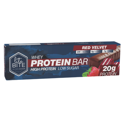 Front packaging of Lite Bite Whey Protein Bar Red Velvet 70g, showing the bar with red velvet cake pieces, 20g protein, high-protein low-sugar claims, and calorie/sugar/fat callouts.