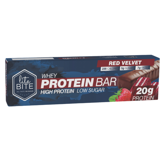 Front packaging of Lite Bite Whey Protein Bar Red Velvet 70g, showing the bar with red velvet cake pieces, 20g protein, high-protein low-sugar claims, and calorie/sugar/fat callouts.